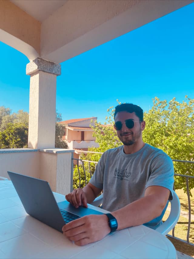 Mike McDonnell designing a website while working remotely